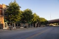 Tulsa USA Greenwood Avenue famous Black Wall Street destroyed during the Tulsa Massacre with trees lining street and Royalty Free Stock Photo