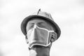 .Iconic Golden Driller - Huge statue of oilfield worker near Route 66 in Oklahoma wearing facial mask during