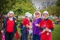 Tulsa USA Older women stand in park with handmaiden hats and red tee shirts and Reproductive Rights Rally Royalty Free Stock Photo