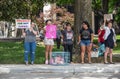 7-2-2019 Tulsa USA -Protesters at park with signs and dolls in a cage-Children are not pawns - is this what it means to be pro-