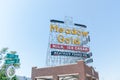 Restored Meadow Gold neon on corner 11th Street and Quaker Ave, buidlings and street scenes Tulsa, Oklahoma on Route 66