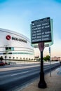 Tulsa USA Sign pointing toward Tulsa Downtown attractions with BOK Center blurred in background Royalty Free Stock Photo
