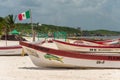 Colorful fishermen boats on Playa Tulum.