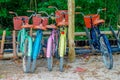 TULUM, MEXICO - JANUARY 10, 2018: Outdoor view of five bikes parked in a row in the enter of Mayan ruins of Tulum in Royalty Free Stock Photo