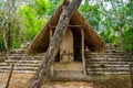 Nohoch Mul Pyramid and stele at the ancient ruins of the Mayan city Coba Royalty Free Stock Photo