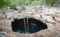 TULUM, MEXICO - Oct 11, 2019: Cenote Calavera jump