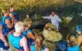 Mayan shaman makes purification ceremony in cenote in Tulum Mexico
