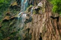 Tumalog waterfall in a mountain gorge in the tropical jungle of the Philippines, Cebu Royalty Free Stock Photo