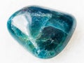 tumbled green blue Apatite gemstone on white Royalty Free Stock Photo