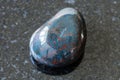 Tumbled Heliotrope Bloodstone gemstone on black Royalty Free Stock Photo