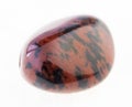 tumbled mahogany obsidian gemstone on white