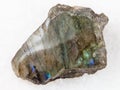 tumbled slab of labradorite stone on white