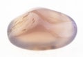 tumbled translucent chalcedony stone on white