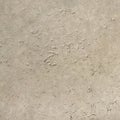 Tumbled travertine tile texture in ivory Royalty Free Stock Photo