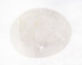 tumbled white translucent agate gemstone on white