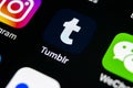 Tumblr plus application icon on Apple iPhone X smartphone screen close-up. Tumblr plus app icon. Tumblr is internet online social Royalty Free Stock Photo