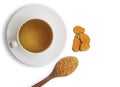 Closeup ceramic cup of hot Turmeric tea with tumeric powder Royalty Free Stock Photo