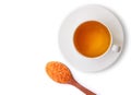 Ceramic cup of hot Turmeric tea with tumeric powder Royalty Free Stock Photo