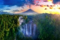 Tumpak Sewu Waterfall and Semeru mountain at sunrise, Indonesia