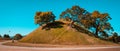 Tumuli royal tomb in autumn foliage backgroung. Gyeongju, South Korea Royalty Free Stock Photo