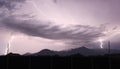 A Tumultuous Sky Over the Mountain Peaks Royalty Free Stock Photo