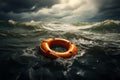 In tumultuous waters, an orange life buoy floats on a stormy day