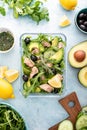 Tuna arugula salad prepared ahead and packed in a glass lunch box