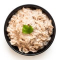 Tuna mayonnaise in a black ceramic bowl. Top view