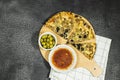 tuna pizza with cheese and tomato and olives with tomato bowl on cutting wooden Royalty Free Stock Photo