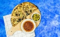 tuna pizza with cheese and tomato and olives with tomato bowl on cutting wooden Royalty Free Stock Photo