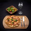 Tuna pizza with shrimp, salad and water Royalty Free Stock Photo