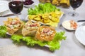 Tuna salad baskets, with shrimp salad leaves, baked potatoes, top view