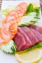 Tuna and salmon sashimi on black dish Royalty Free Stock Photo