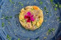 Tuna and salmon tartar served in blue crockery