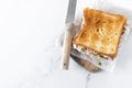 Tuna sandwich with mayo and vegetables on white marble background Royalty Free Stock Photo