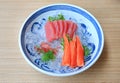 Tuna Sashimi served with Seaweed and Crab sticks on ice. Raw fish in traditional Japanese style food Royalty Free Stock Photo