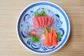 Tuna Sashimi served with Seaweed and Crab sticks on ice. Raw fish in traditional Japanese style food Royalty Free Stock Photo