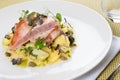 Tuna steak fish with sauteed potatoes and capers lemon sauce. Traditional Italian dish