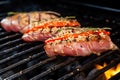 tuna steak on a grill, sesame seeds visibly charring Royalty Free Stock Photo