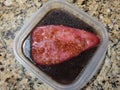 Tuna Steak in a Marinade Bath Topped with Minced Garlic