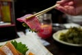 Tuna Sushi with Chopsticks Royalty Free Stock Photo