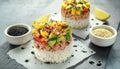 Tuna sushi stacks with mango, cucumber, tomatoes salsa served with balsamic vinegar, nigela ans sesame seeds Royalty Free Stock Photo