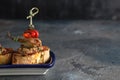 Tuna tapas with onion, pepper and capers Royalty Free Stock Photo