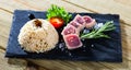 Tuna Tataki garnished with rice