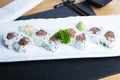 Tuna uramaki in Japanese restaurant.