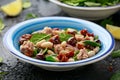 Tuna, white bean salad with olive, red onion, spinach and dried tomato. Healthy food. Royalty Free Stock Photo