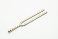 A tuning fork 440 Hz on a white background Royalty Free Stock Photo