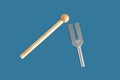 Tuning fork in sound therapy or tunning musical instruments Royalty Free Stock Photo