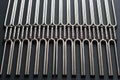 Tuning fork vertical pattern on a black background, side view