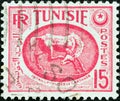 TUNISIA - CIRCA 1950: A stamp printed in Tunisia shows Horse bas-relief, Carthage Museum, circa 1950.